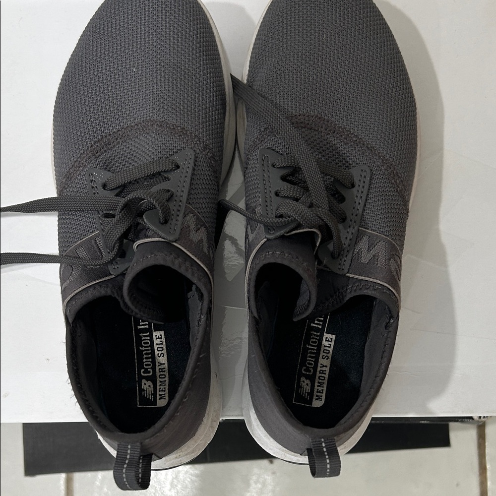 New Balance women’s and Gray Sneakers